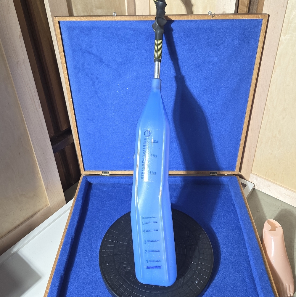 The SwingWave Weighted Golf Swing Trainer.